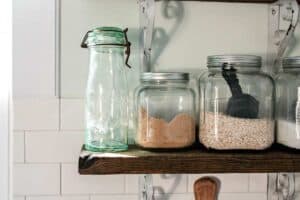 open kitchen shelf with jars of dried goods
