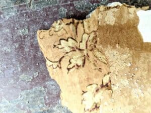 antique farmhouse floral wallpaper remnant salvaged during renovation