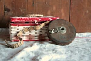 vintage sewing tape measure and sewing basket budget friendly gift idea