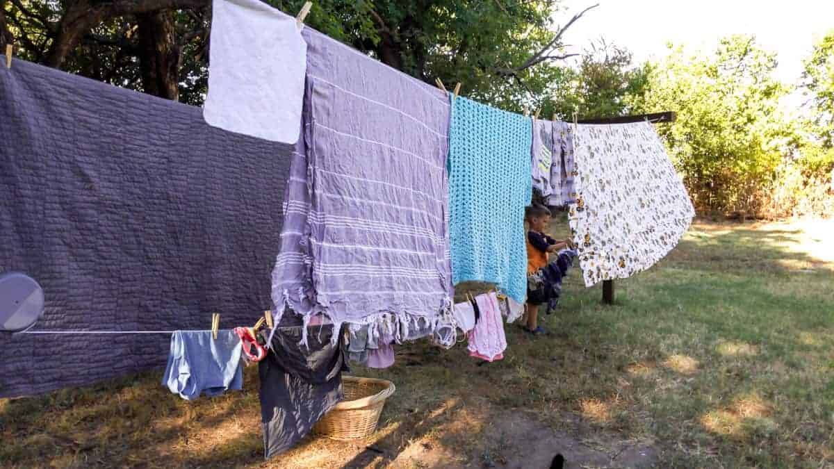 linens drying outside on clothes line