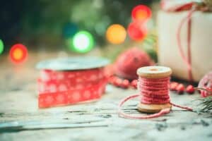spools of string and ribbon for making christmas tree garlands