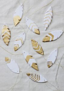 diy white and gold clay feathers christmas tree garland