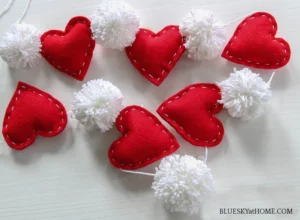 diy pom pom and heart valentine garland